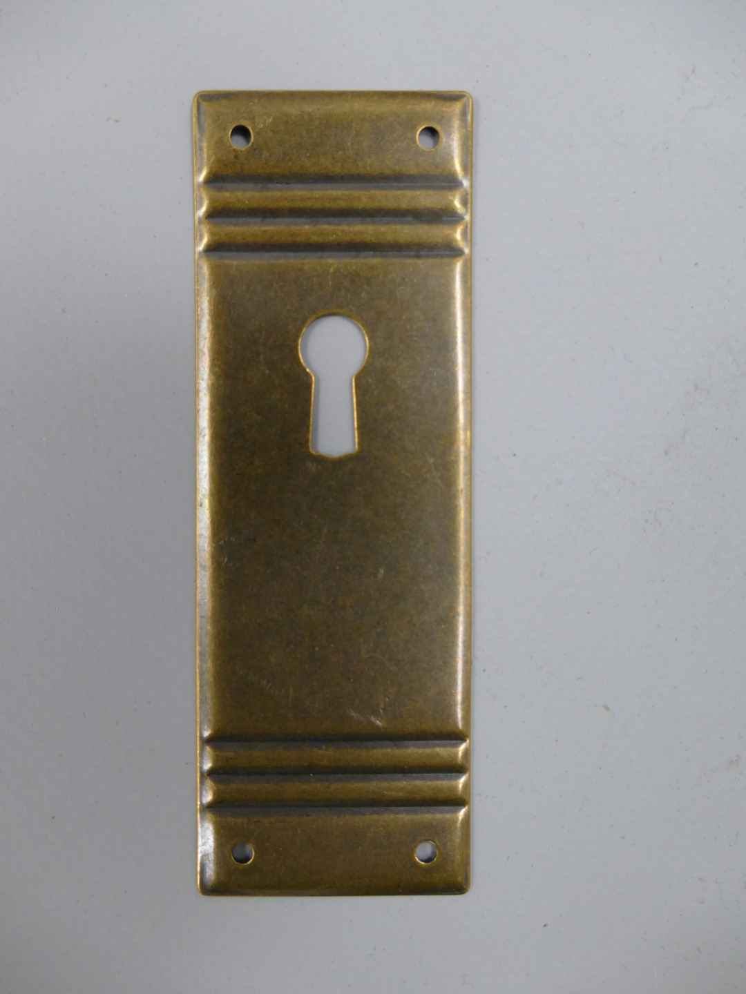 Beschlag Messing brüniert Loch oben 32x95mm