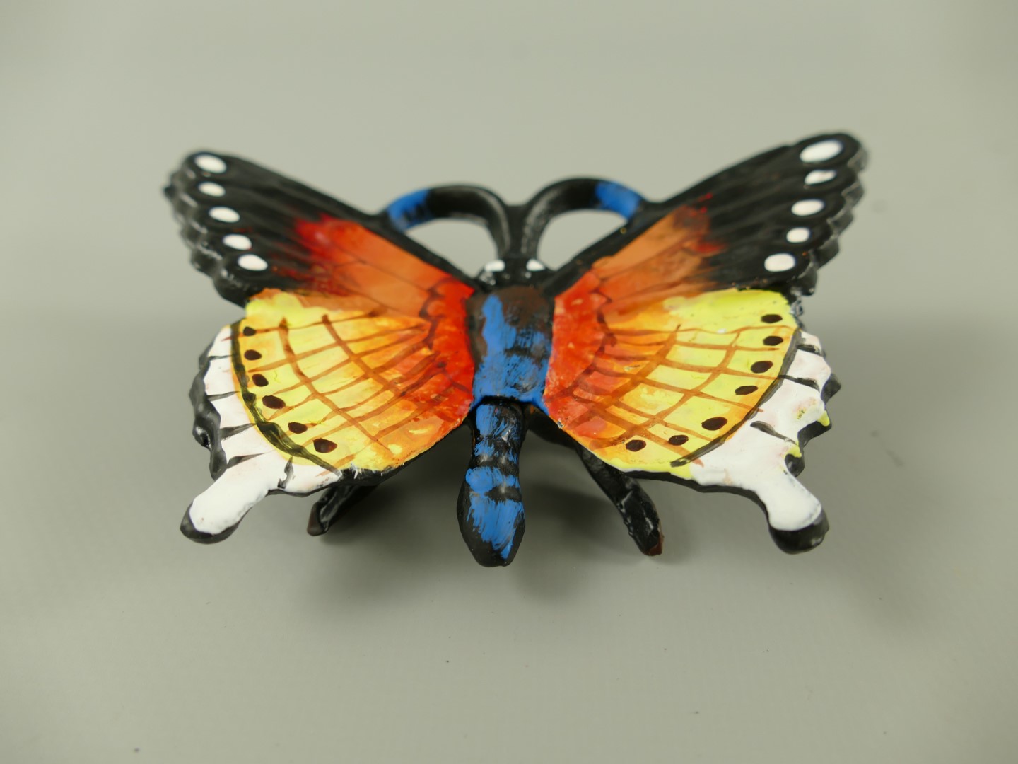 265158a Smetterling Eisen farbig L.12x4cm
